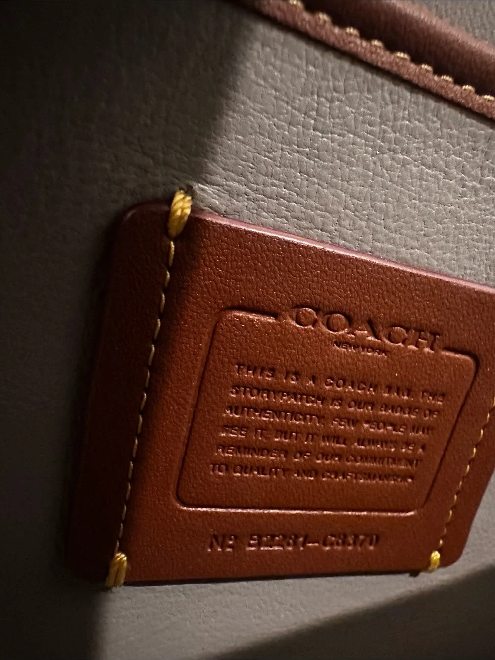 Coach compact quilted